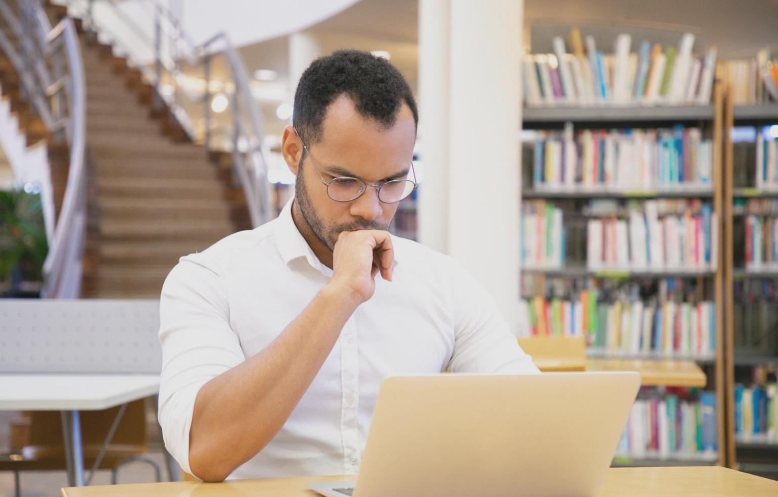 Financial analysts collaborating on valuation models in modern office environment